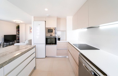 Cornella de Llobregat Apartment | Vacation Apartment "Sunsets & Pool in Barcelona" with Balcony, Shared Pool & Wi-Fi