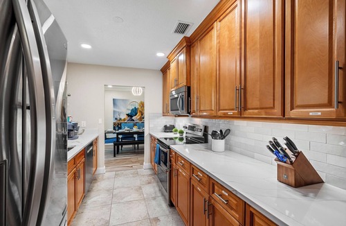 Tropic Palms House | VacationSunwind:Delray home! SW Pool, Fish, Dock, Water front, Close to Bch