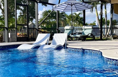 Tropic Palms House | VacationSunwind:Delray home! SW Pool, Fish, Dock, Water front, Close to Bch