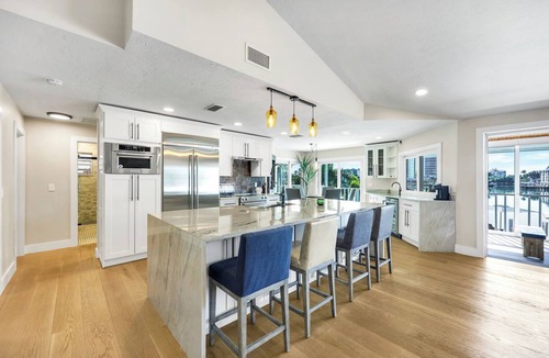 Connors House | Vanderbilt Lagoon Waterfront Home - HUGE VIEWS - Walk to Vanderbilt Beach
