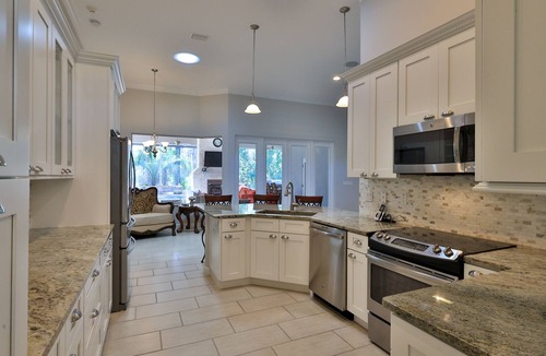 New Smyrna Beach House | Venetian Bay Luxury 4 Bedroom Estate Pool Beach Home Gated Golf Access Community