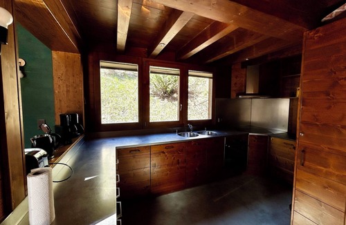 Grimentz Ski Chalet | Very comfortable chalet with sauna for 8-10 persons : Living room with fireplace - kitchen with dish