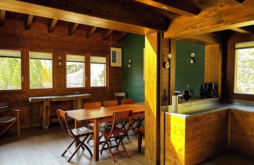 Grimentz Ski Chalet | Very comfortable chalet with sauna for 8-10 persons : Living room with fireplace - kitchen with dish