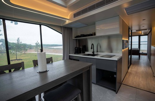 Runaway Bay Apartment | Vessel 9 - Nature Meets Comfort in a Stylish Vessel | BBQ Lakefront AC