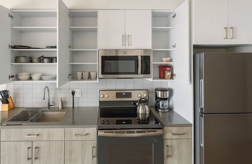 Five Points South Apartment | Vibrant 2BR Stay | Pool, Sauna & Lounge