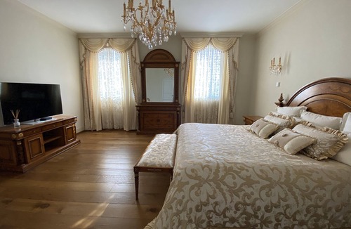 Agra Apartment | View apartment in the five-star Resort Collina d'Oro with access to the SPA.