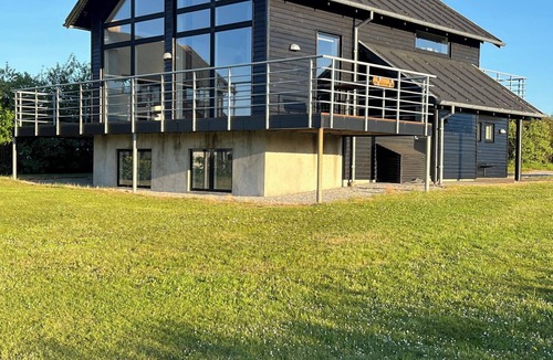 Skjern House | View house by nature and golf