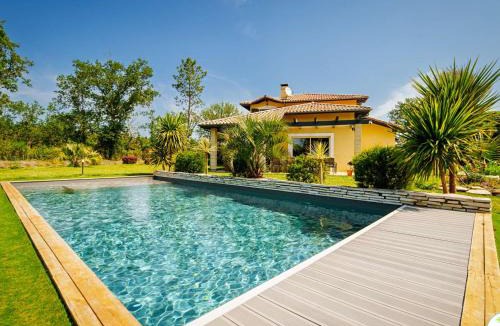 Parentis-en-Born Villa | Villa 5 étoiles avec piscine chauffée, 4 ch. avec SDB privées et BBQ - Jusqu'à 12 pers. - FR-1-877-49