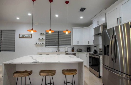 Highland Garden House | Villa Caicos | Outdoor Kitchen | Fire Pit | Pool