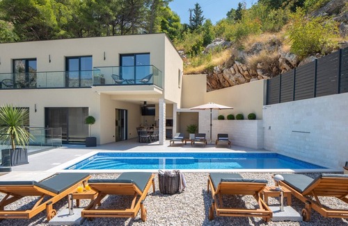 Borak Villa | Villa Casa Vita features a sea view, billiards, sauna, and a heated pool