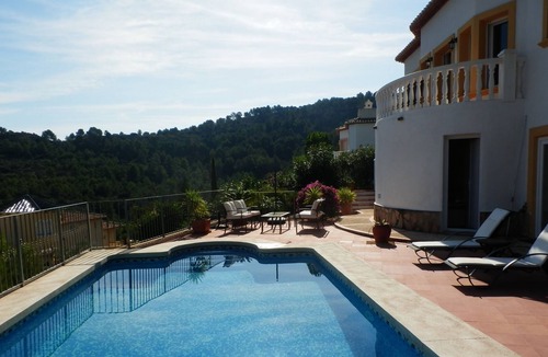 Ensanche Diputacion House | Villa Elizabeth is a private detached villa set in its own garden with a pool.