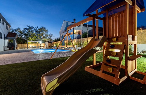 Zemunik Donji Villa | Villa Heaven, 12 PAX, private heated pool, pet friendly, children's playground