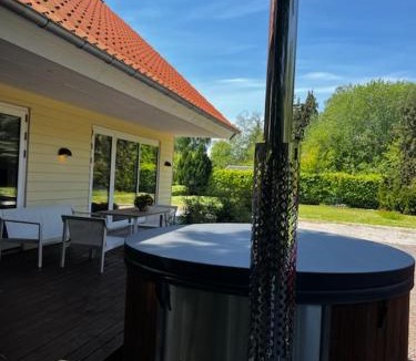 Kettinge House | Villa Jule - Cozy and Elegant Place with Open Ceiling, Beautiful Garden and Specious Terrace