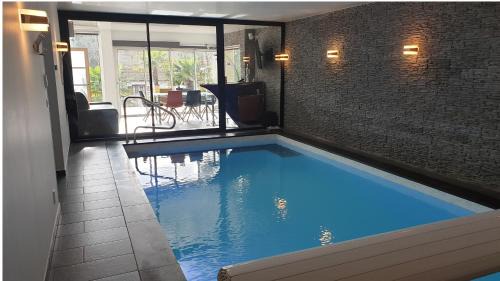 Hardelot-Plage Apartment | Villa les Agapanthes avec piscine et SPA chauffée dans votre appartement