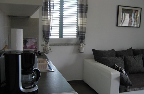 Cesarica Apartment | Villa Luce. New Spacious apartment 70 m from the sea, with sea view at Karlobag.