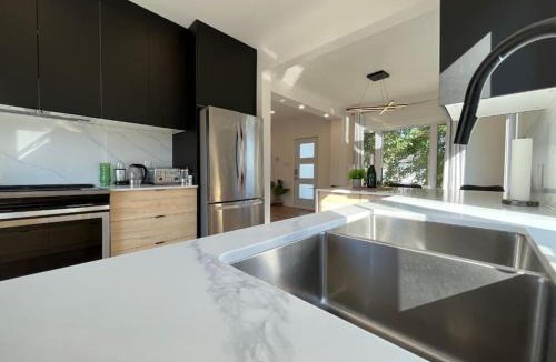 Trois-Rivieres Ouest Villa | Villa luxueuse avec vue sur le fleuve Villa GrandeCasa