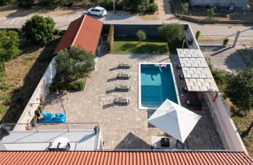 Benkovac Villa | Villa Pietra- Modern rustic poolside oasis