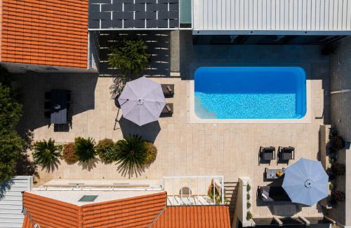 Milna (Brac) House | Villa TM with private heated pool, poolhouse & private garage