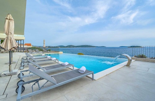 Rogoznica Villa | Villa Valiosa - stunning beachfront villa with a pool and a sauna for ten guests by MyWaycation