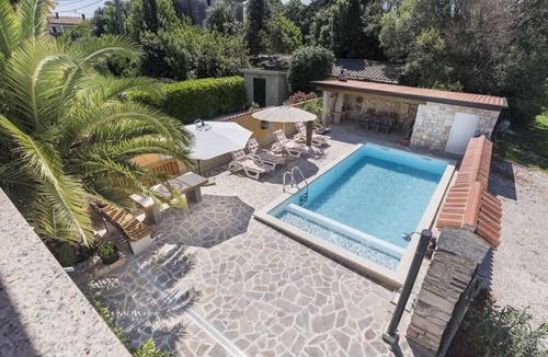 Savudrija Villa | Villa with heated pool on the edge of an olive grove overlooking the sea