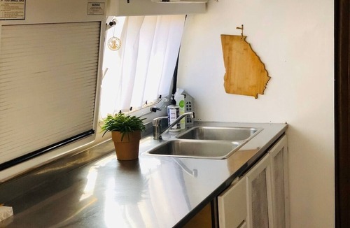 Summerhill Apartment | Vintage Airstream Tiny House on Urban Flower Farm