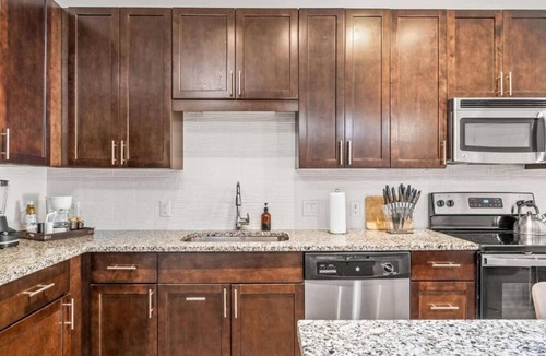 Central Business District Apartment | Virelli Apartments Upscale King Suite in the Heart of Orlando w Pool