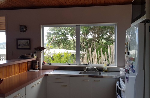 Langs Beach House | Virtually beachfront family bach, secluded Ding Bay (Langs)