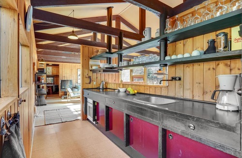 Rrvig House | Visit this charming wooden house surrounded by wonderful nature.