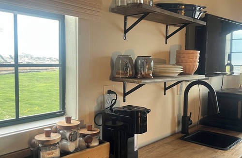 Leamington Cabin | Wake up to the beautiful sunrise on Lake Erie in this tiny lakeside cabin.