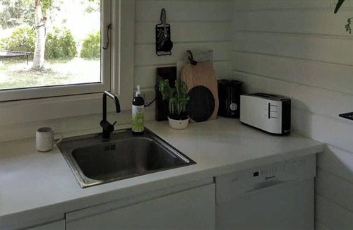 Sklskr House | Wake up with water views from Omø