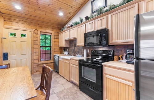 Branson Theater District Cabin | Walk-in Cedar Cabin with Walk-in Shower, Gas Fireplace, & Covered Balcony. Golf/Ticket Discounts
