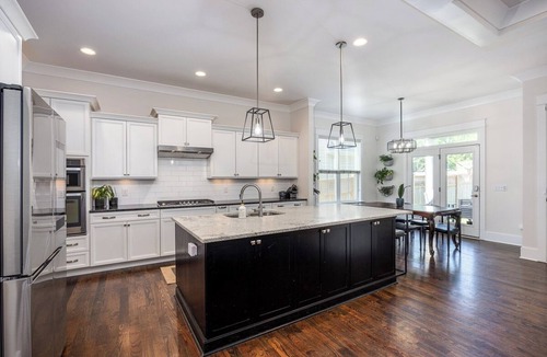 Shelby Hills House | Walk to Stadium & Downtown/King Beds/Porches/Cardio Equip