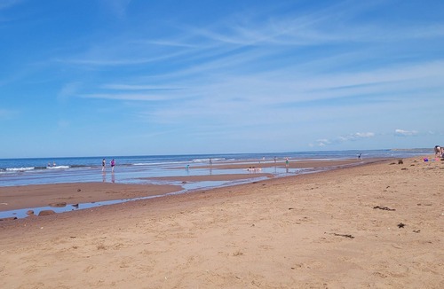 York Cottage | Walk to Stanhope Beach from our private 2 bedroom well equipped cottage.