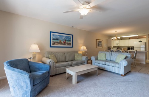 Heron Harbour Isle Condo | Walk to the beach - Condo near the bay with private balcony & pool access