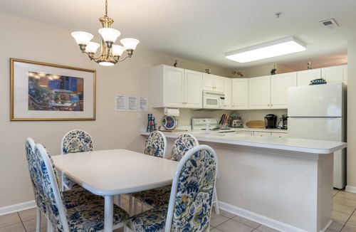 Heron Harbour Isle Condo | Walk to the beach - Condo near the bay with private balcony & pool access