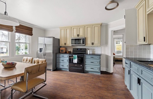 Graham House | Walk to town center, hot tub, game room, fire pit, pet friendly and more