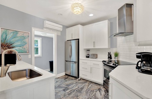 Metropolitan House | Walkable Home in Thomas Square, Heated Pool Access