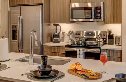 Legacy Park Apartment | Walkable Legacy West King Retreat with Pool