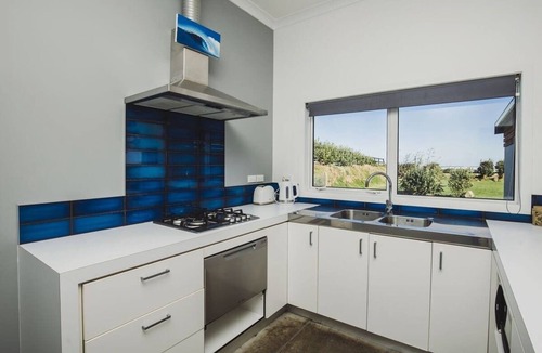 Warea House | Warea Beach Bach with Coastal Views