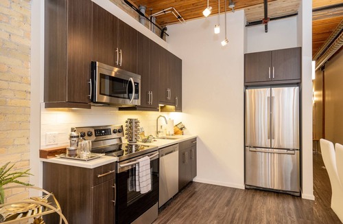 Exchange District Condo | Warehouse Loft in Exchange District w/Parking!