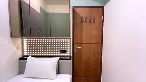 Panakkukang Apartment | Warm and Homey 2BR at Vida View Makassar Apartment By Travelio