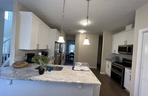 Buford House | Warm, clean, and modern five bedroom house