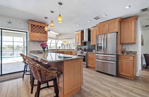 Palm Harbor House | Watch Dolphins Play From The Patio