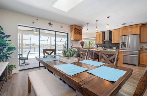 Palm Harbor House | Watch Dolphins Play From The Patio