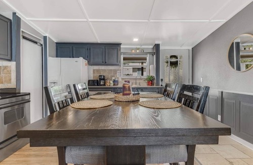 Enchanted Oaks House | Water Front Lake Cabin Pet Friendly and FREE Paddle Boat and Kayaks!