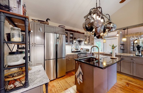 Raymond Cottage | Water view home with kayaks, dock access, firepit, & charming interior - dogs ok