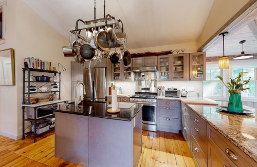 Raymond Cottage | Water view home with kayaks, dock access, firepit, & charming interior - dogs ok