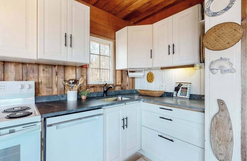 Aquinnah House | Water-view home with large deck, balcony, enclosed sunroom & peaceful location