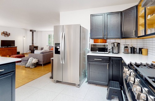 Greenbank House | Water-view home with large deck, firepit, grill, & W/D