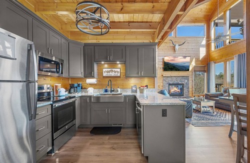Sevierville Cabin | Waterfall, Hot Tub, Fire Pit + 20 Mile View